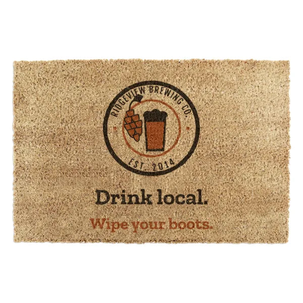 Custom coir doormat with a brewery badge logo, concept design