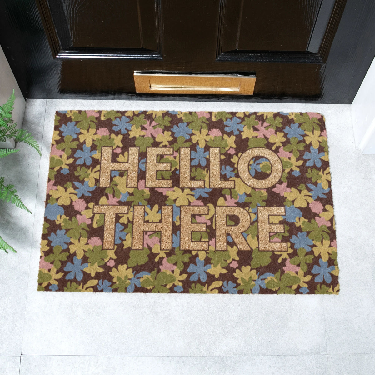 Colourful coir doormat which says hello there